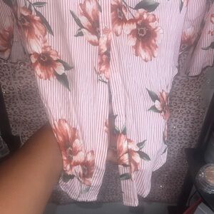 Tie front collared crop top with stretch bottom trim and bell sleeves